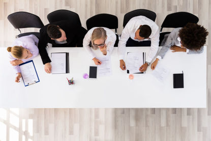 overhead of a group of people meeting