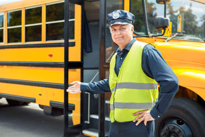 person next to bus